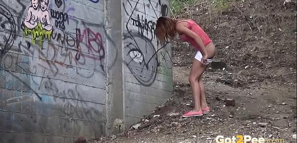  Got2Pee - Pretty babe pulls off her hotpants to piss outside